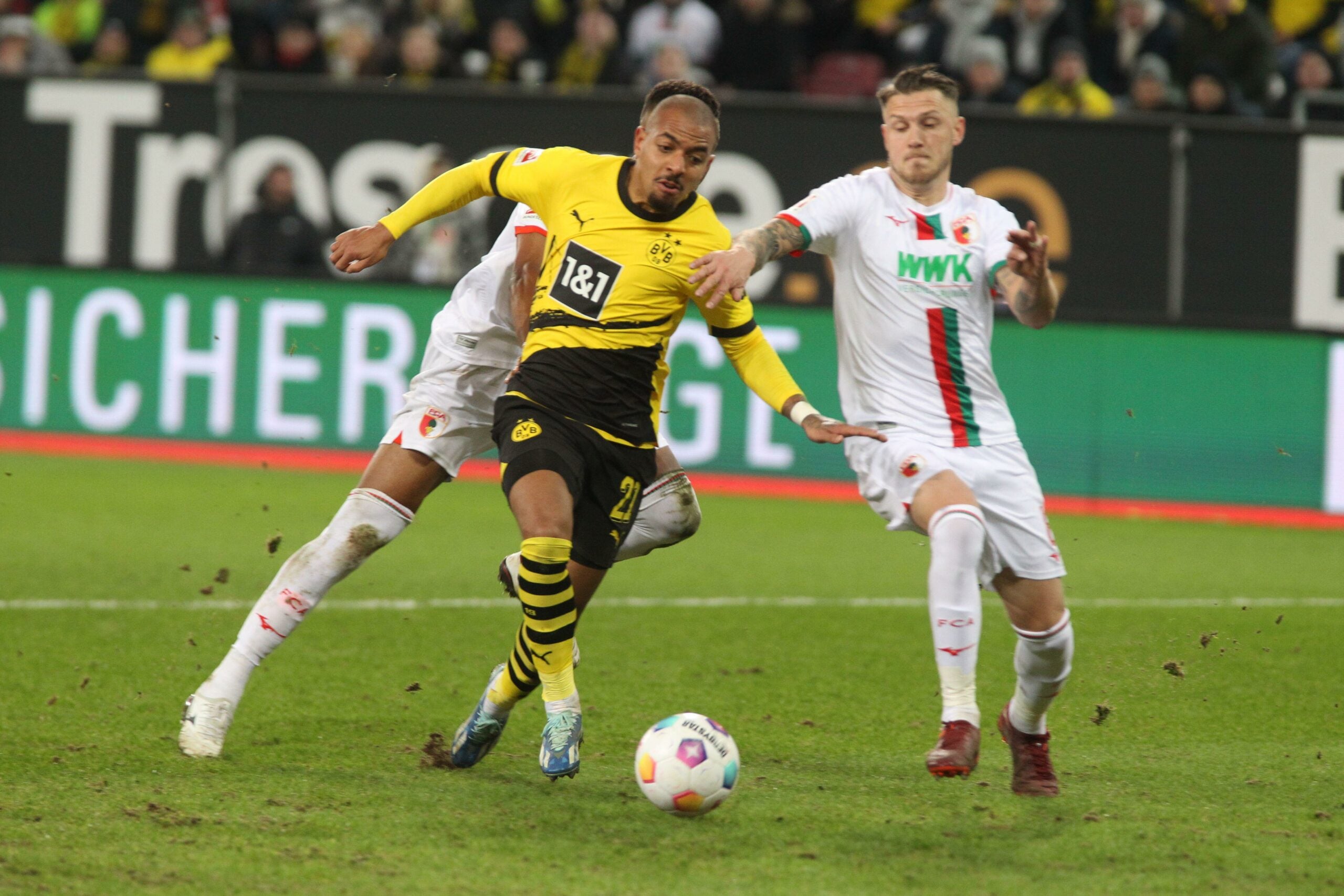 AUGSBURG, Germany - 16. December 2023: 21 Donyell MALEN of Dortmund vs during the Bundesliga Football match between Fc AUGSBURG and BvB Borussia DORTMUND at the WWK Arena in Augsburg on 16. Decemberr 2023 , Germany. DFL, Fussball,